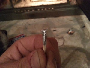 7 - Fold twisted tinfoil over and remove the match